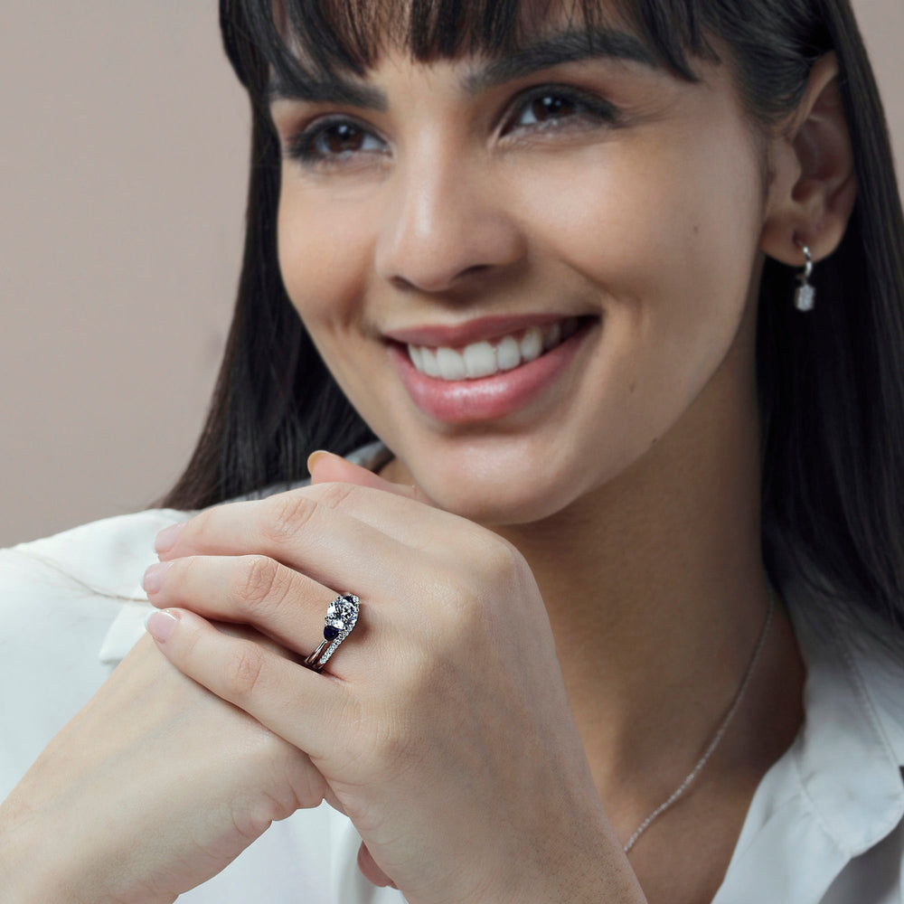 Model Wearing Knife Edge Trillion Engagement Ring with Lab Grown Diamond view