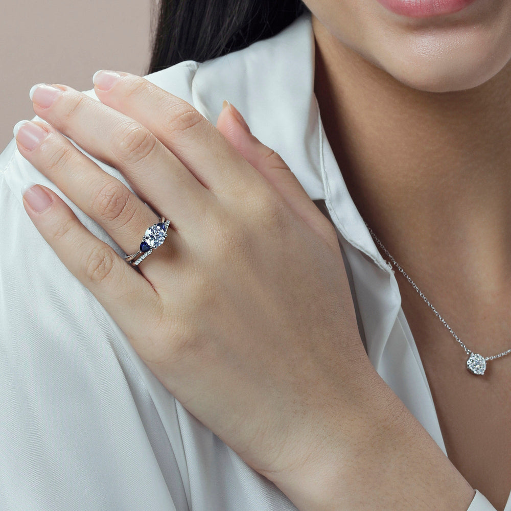 Model Wearing Knife Edge Trillion Engagement Ring with Lab Grown Diamond view