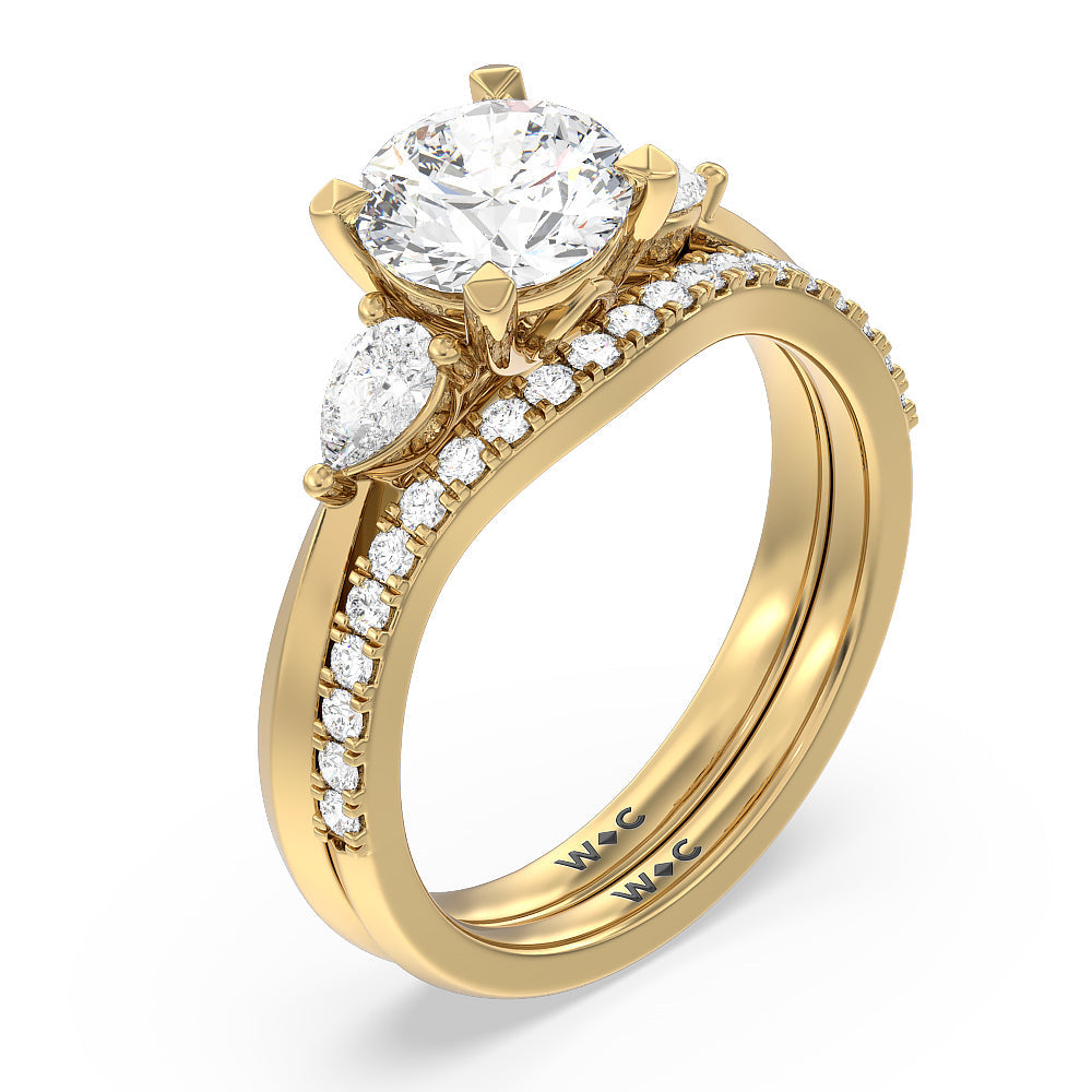 Elegant Three Stone Knife Edge Engagement Ring with Emerald Cut Diamond in 14KT Yellow Gold view 4
