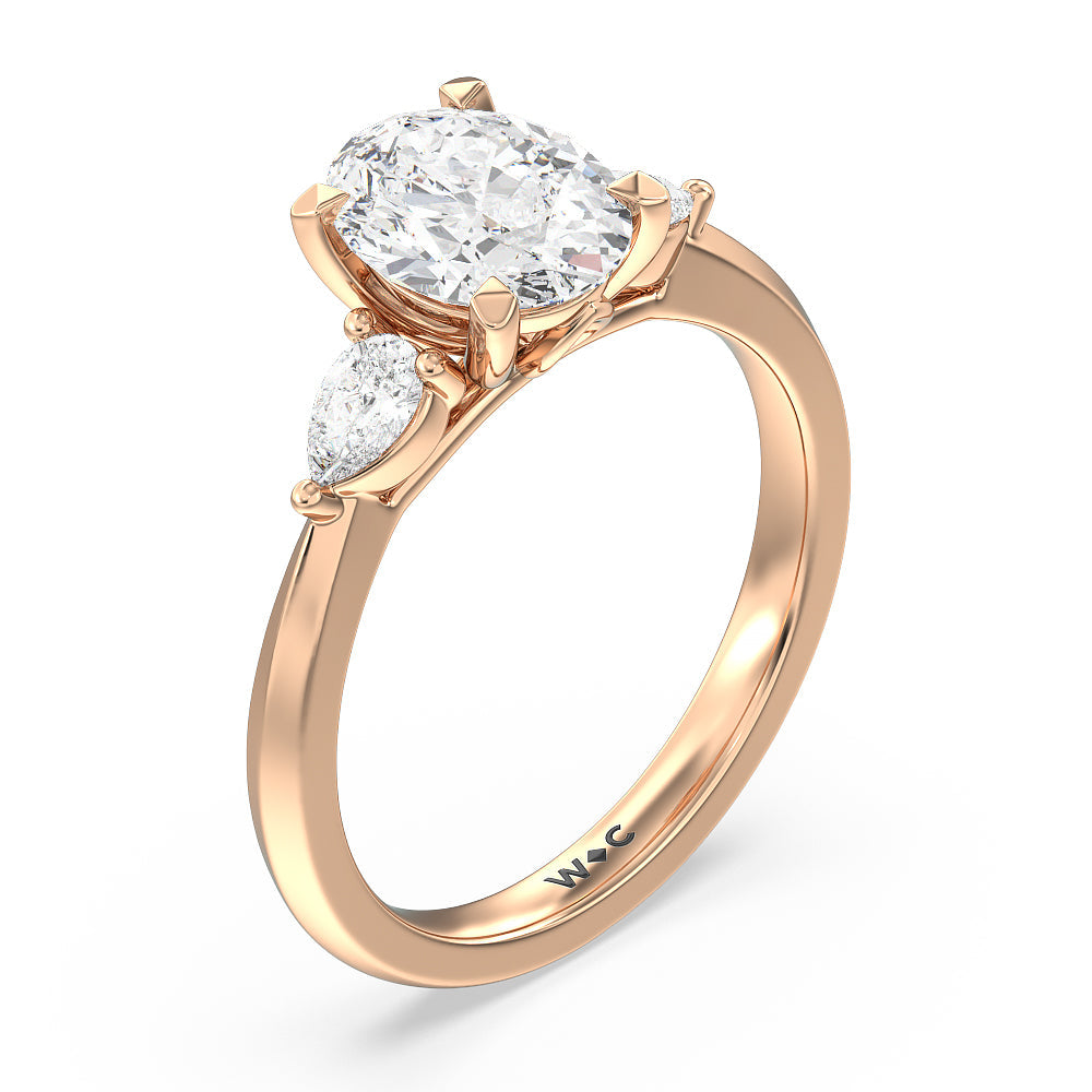 Elegant Three Stone Knife Edge Engagement Ring with Oval Cut Diamond in 14KT Rose Gold view 3
