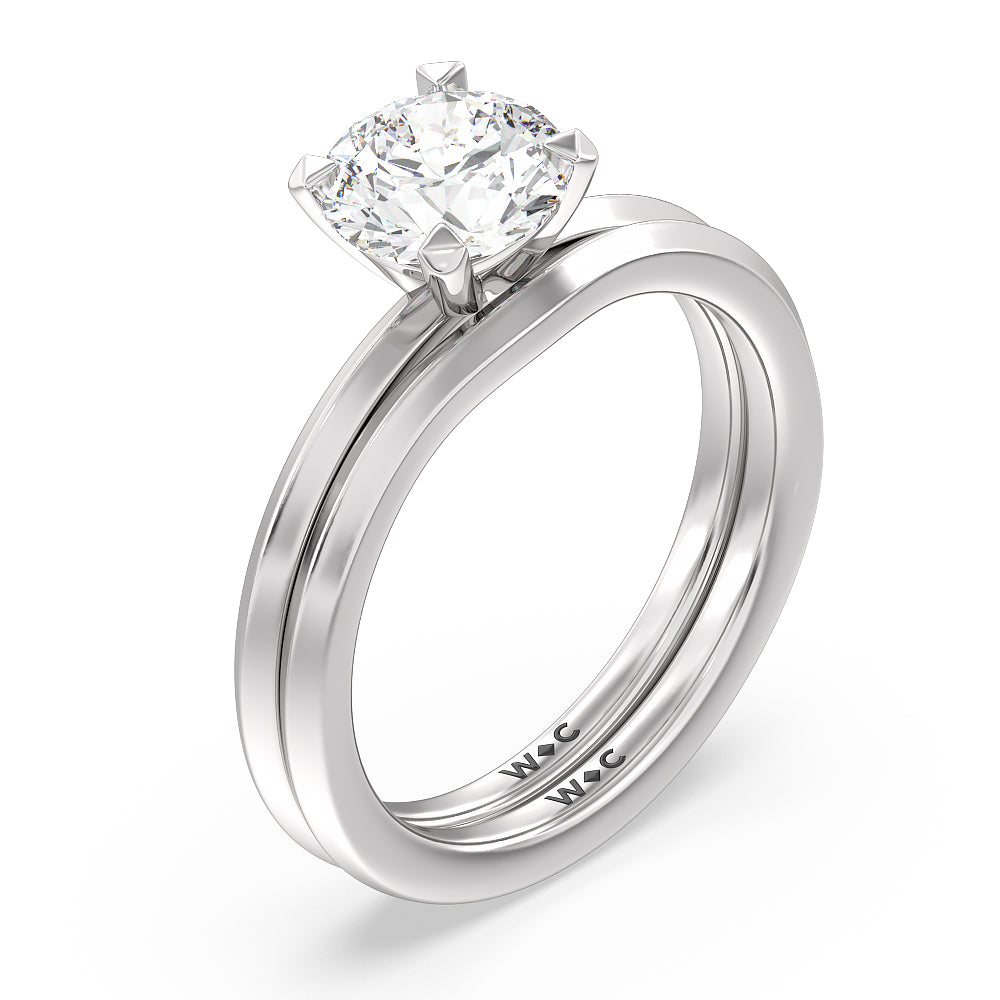 Petite Knife Edge Solitaire Engagement Ring with Emerald Cut Diamond in 14KT Platinum view 4
