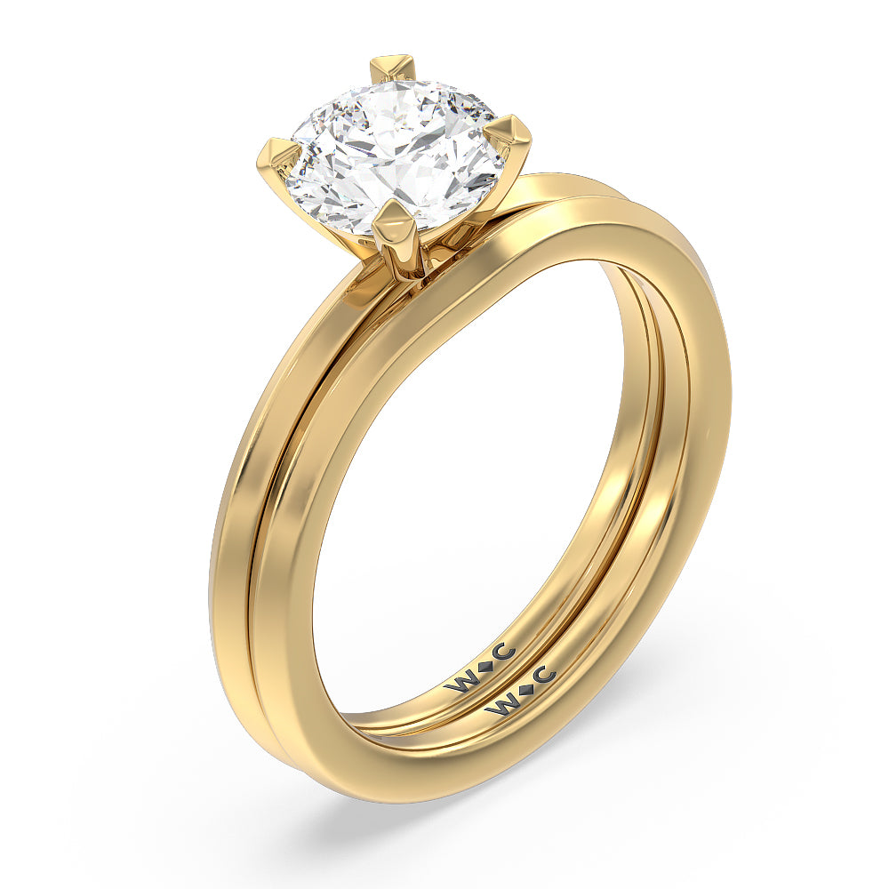Petite Knife Edge Solitaire Engagement Ring with Emerald Cut Diamond in 14KT Yellow Gold view 4
