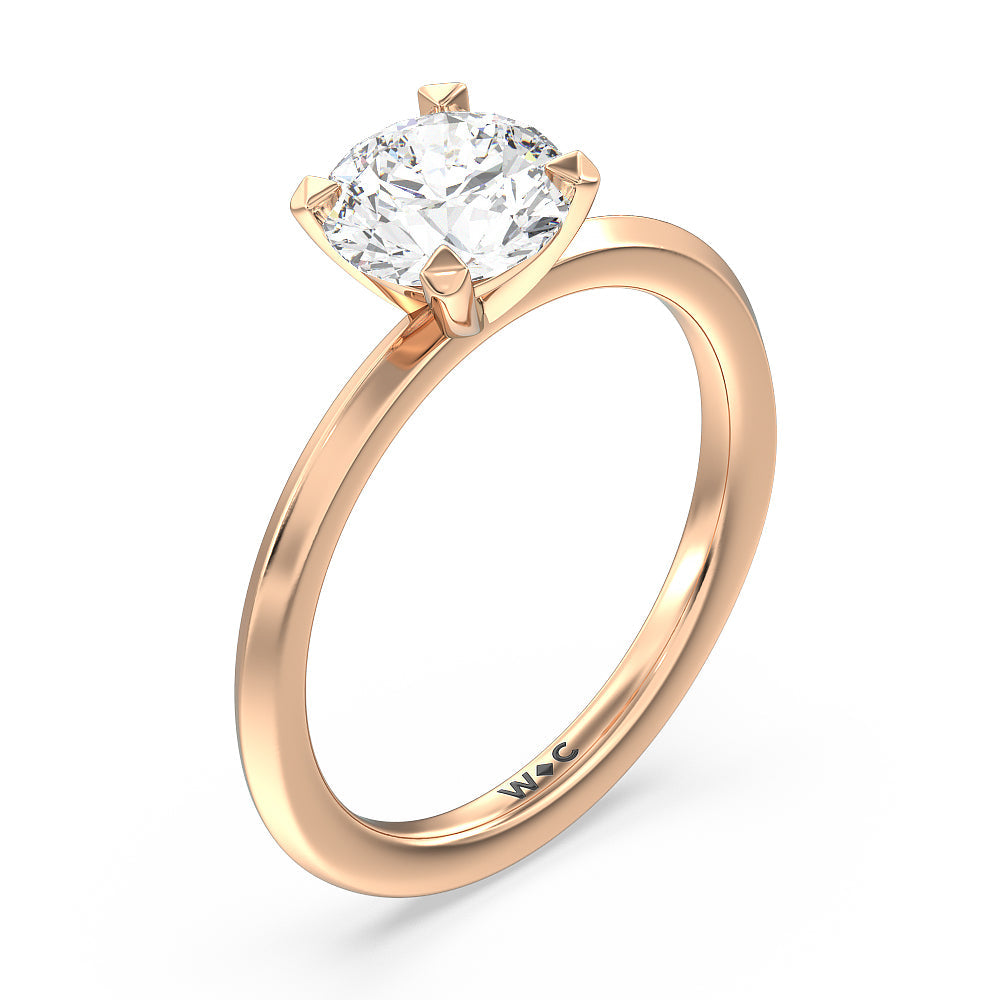Petite Knife Edge Solitaire Engagement Ring with Round Cut Diamond in 14KT Rose Gold view 3
