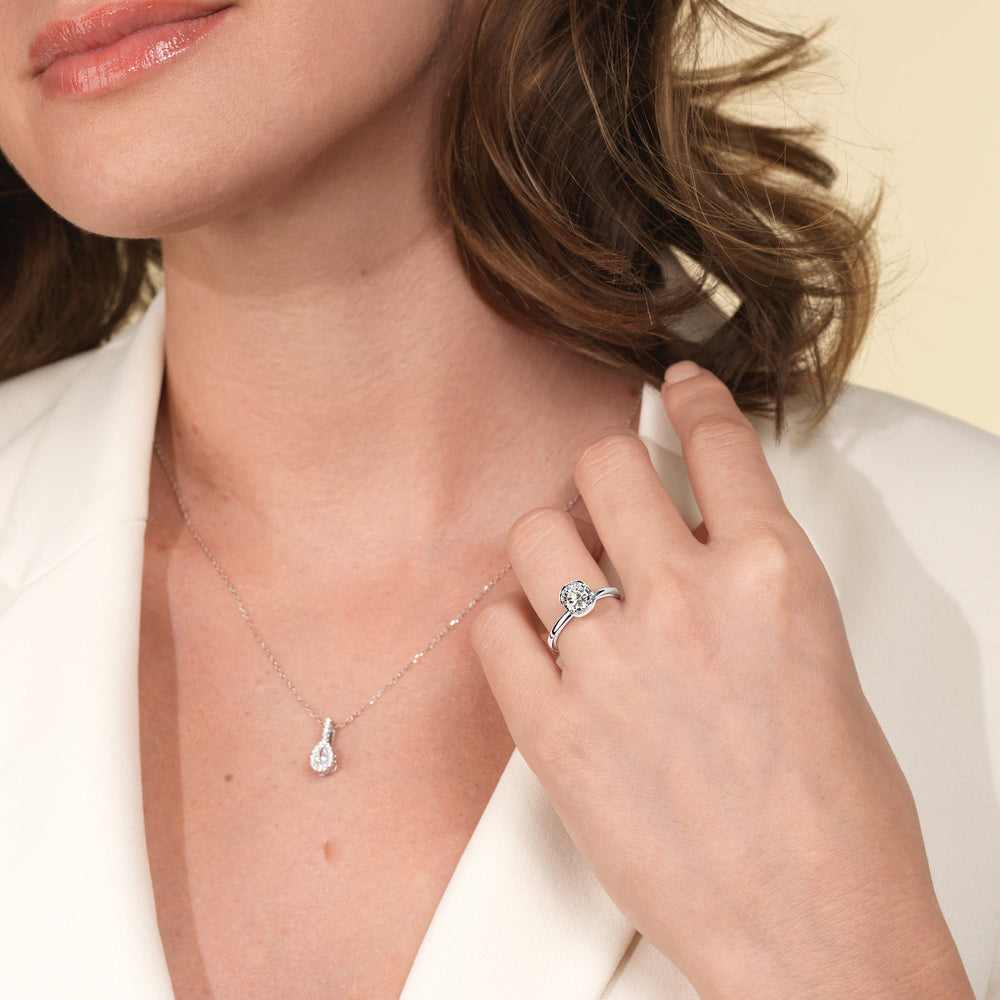 Model Wearing Seamless Half Bezel Solitaire Engagement Ring view