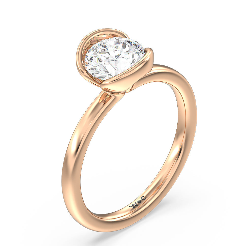 Seamless Half Bezel Solitaire Engagement Ring with Round Cut Diamond in 14KT Rose Gold view 3
