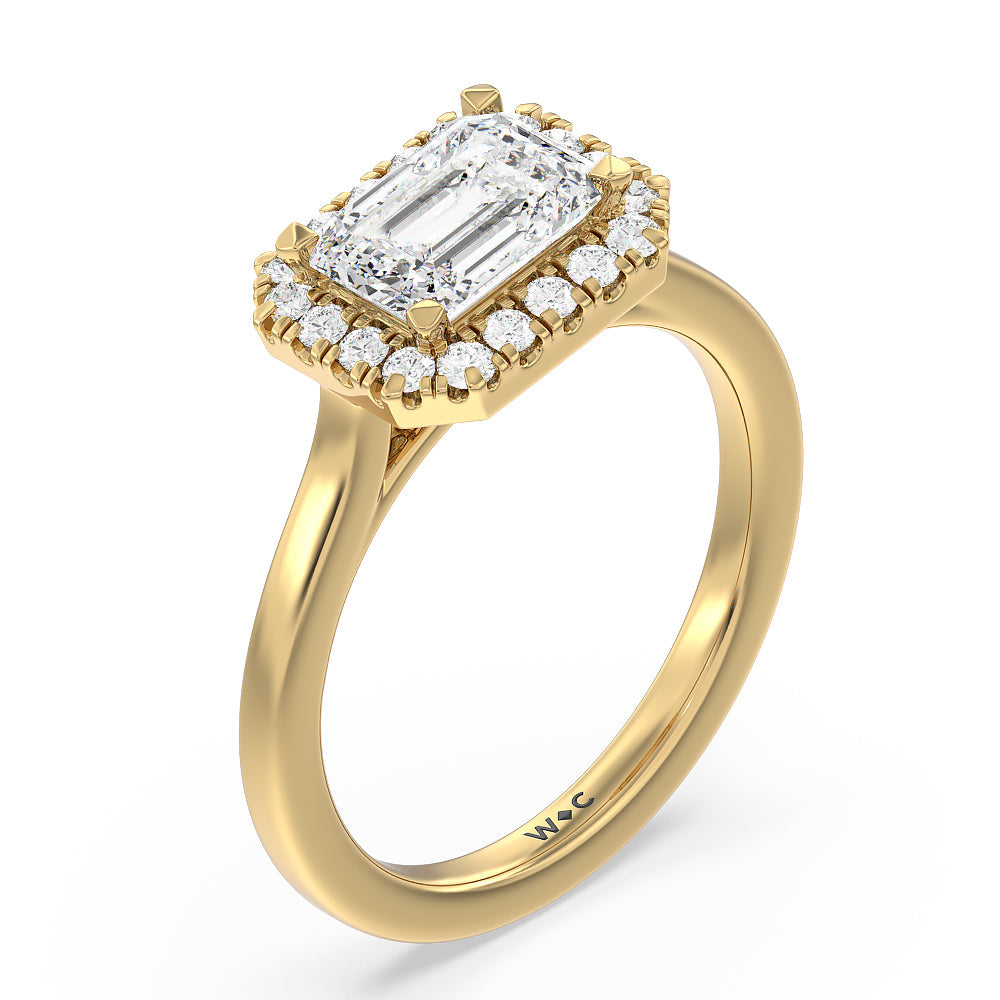 East West Halo Cathedral Engagement Ring with West Emerald Cut Diamond in 14KT Yellow Gold view 3
