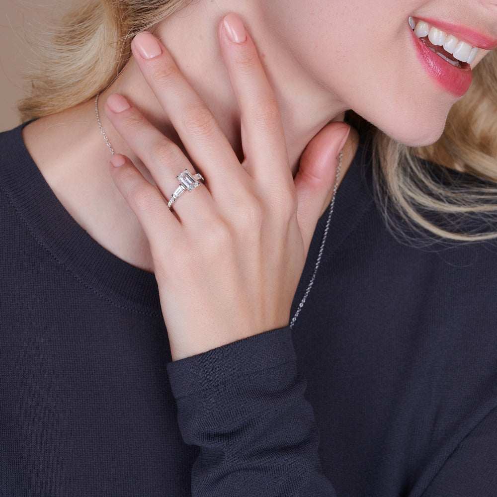 Model Wearing 1 3/4 cttw Round Cut Three Stone Tapered Baguette Diamond Engagement Ring view