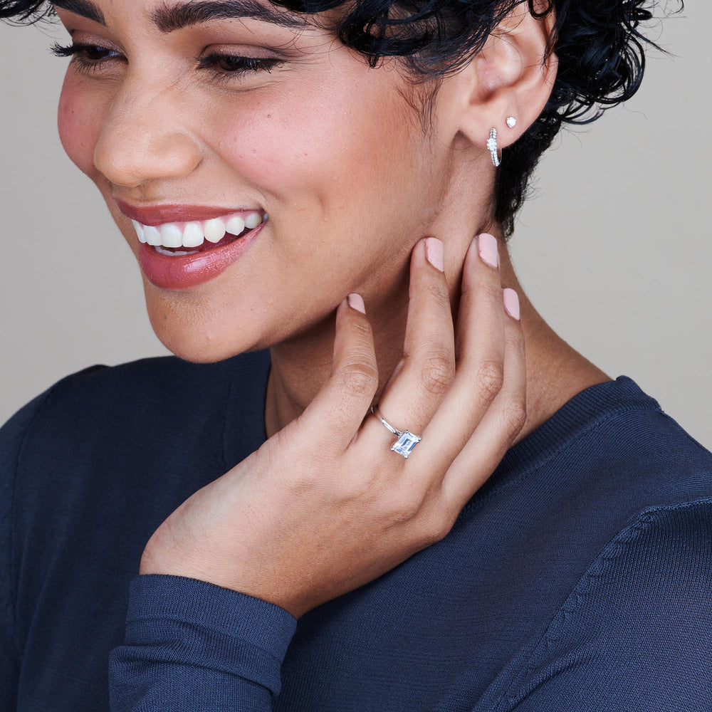 Model Wearing Sleek Cathedral Solitaire Engagement Ring view