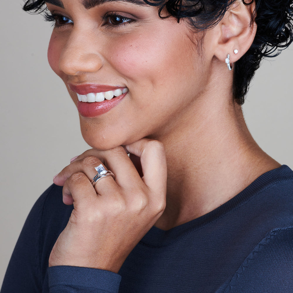 Model Wearing Sleek Cathedral Solitaire Engagement Ring view