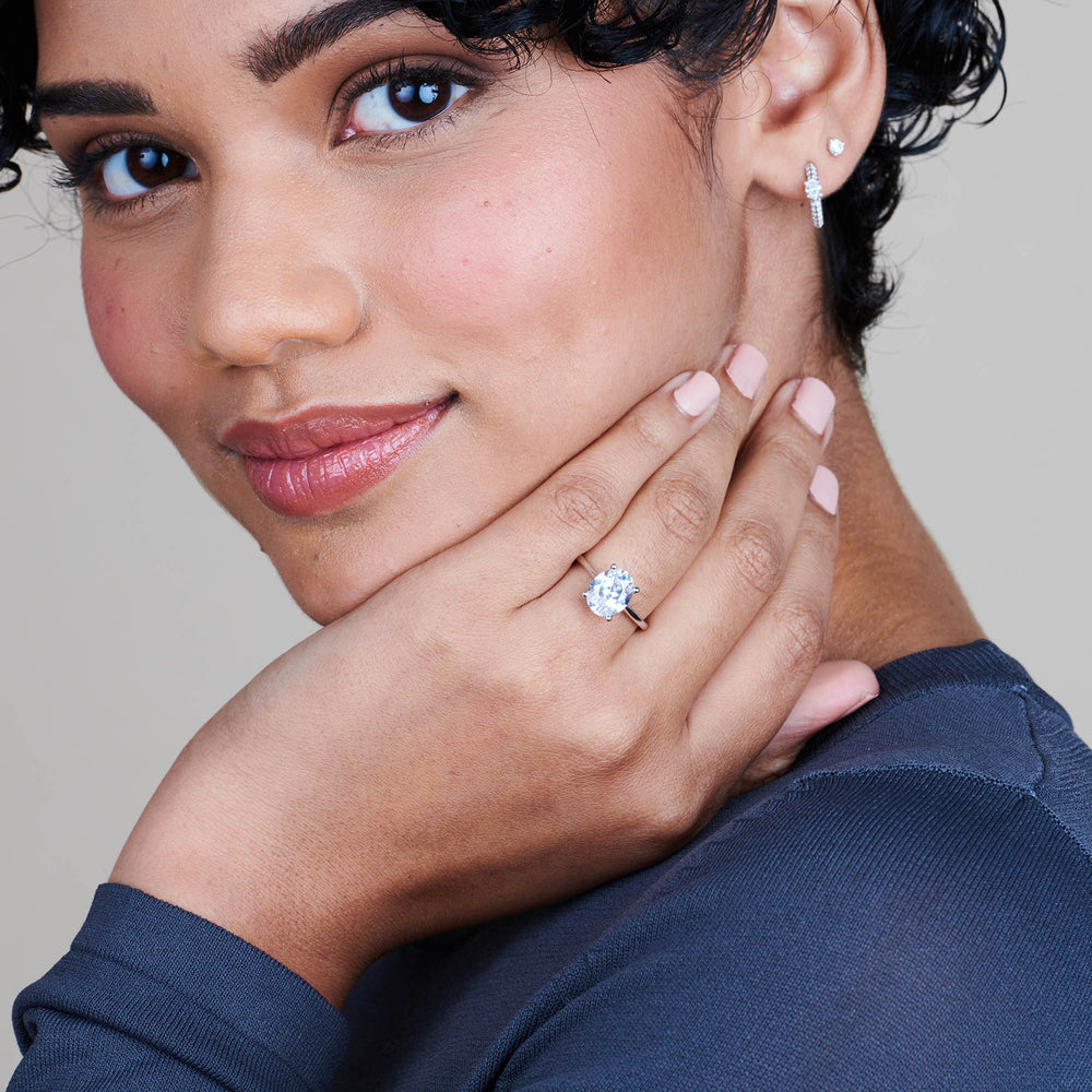 Model Wearing Noveau Four Prong Solitaire Engagement Ring view