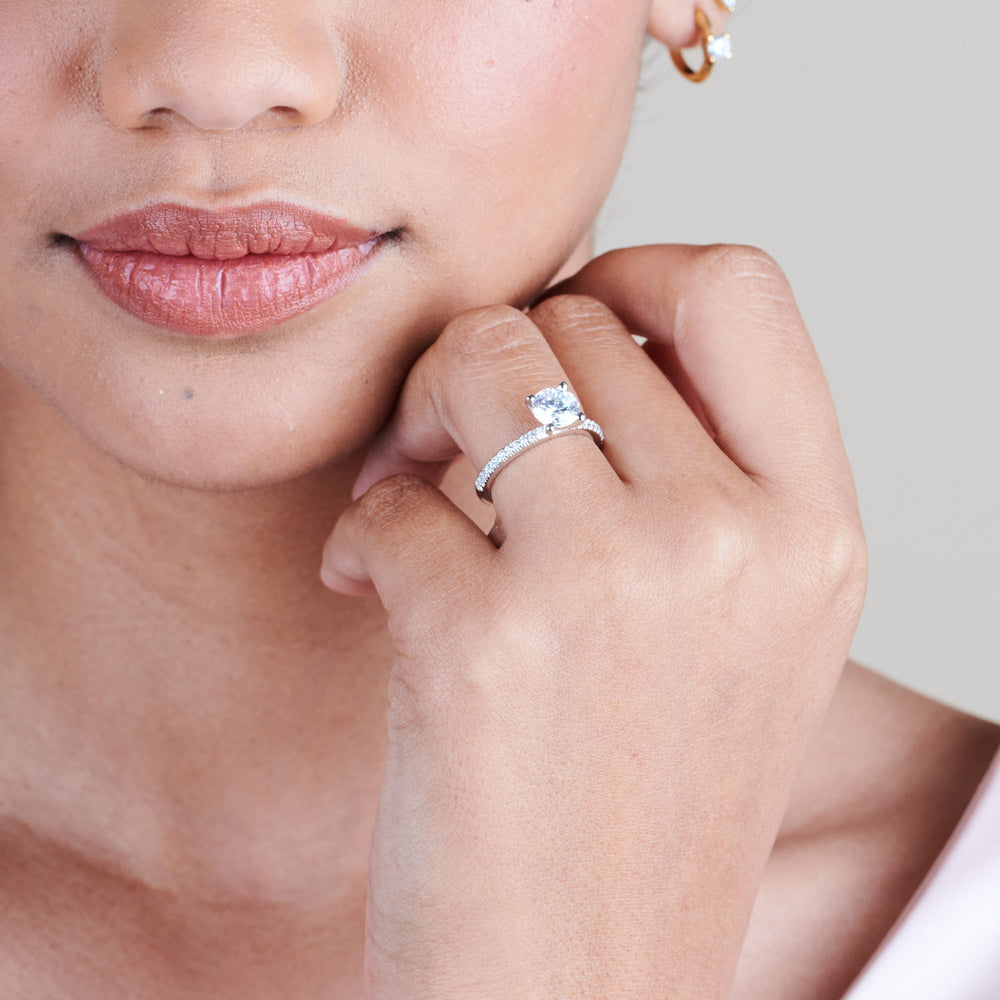 Model Wearing 2 1/5 cttw Oval Cut French Cut Pave Diamond Engagement Ring view