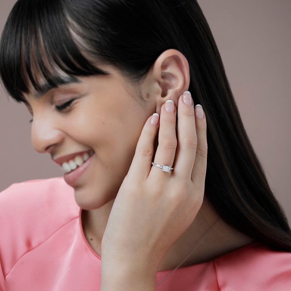 Model Wearing Classic Four Prong East West Engagement Ring view