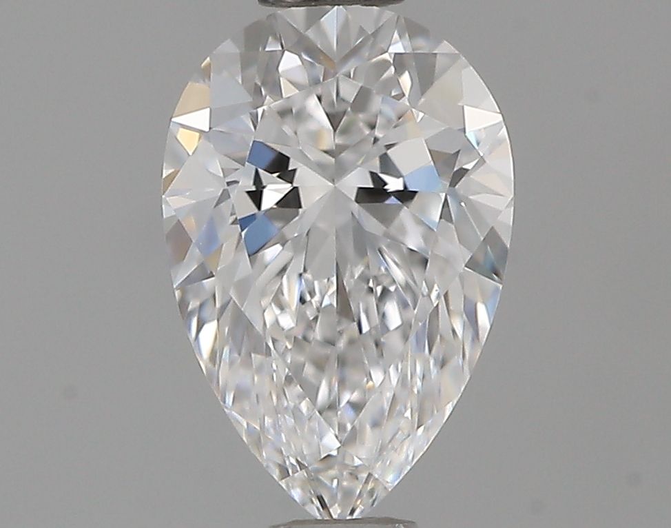 0.71 Carat Pear Natural Diamond with  Cut Diamond in 14KT  view 1
