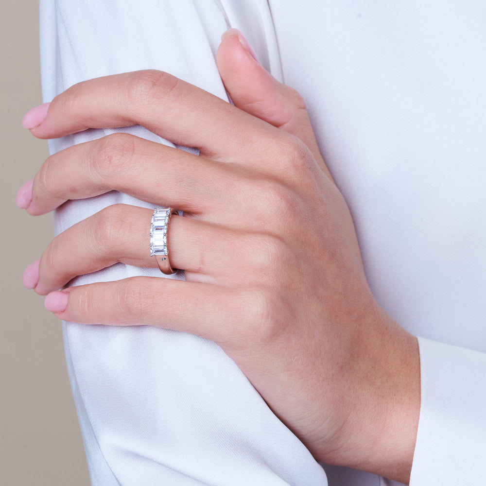 Model Wearing Five Stone Emerald Cut Diamond Ring (F/G SI+) view