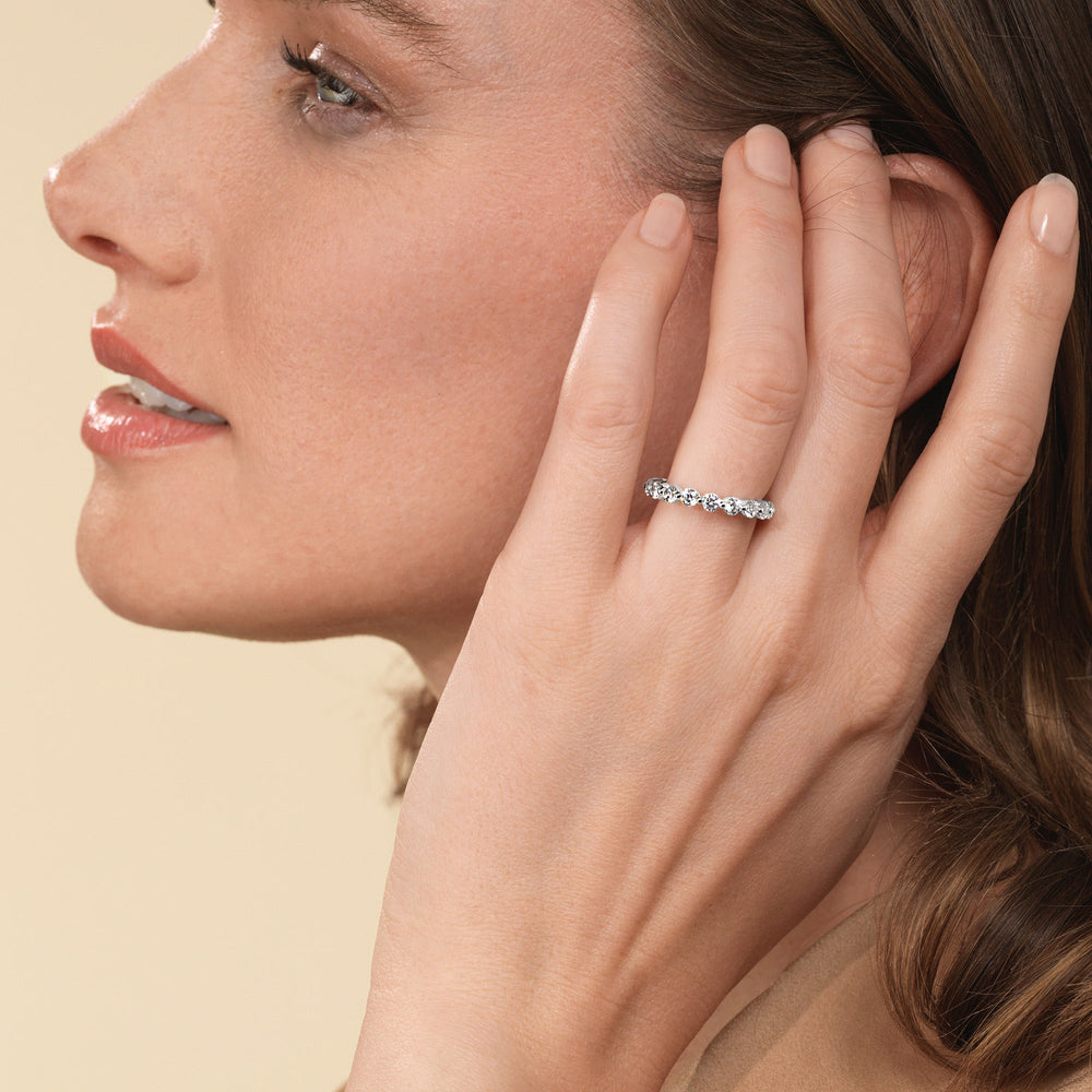 Model Wearing Scalloped Single Prong Round Diamond Eternity Ring view